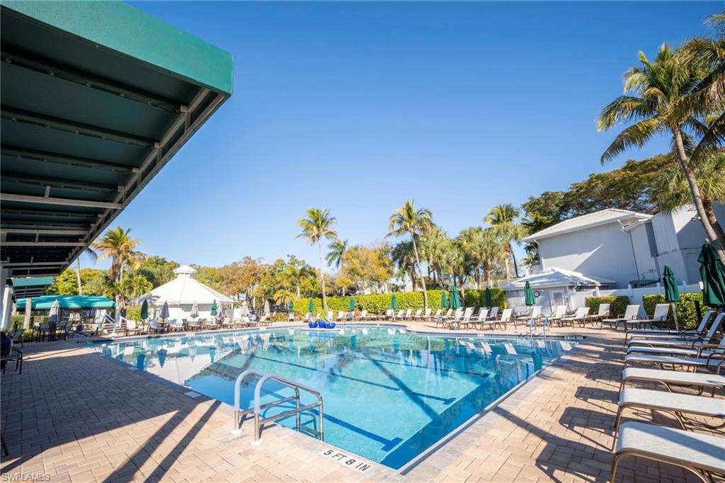 Community pool featuring a patio area