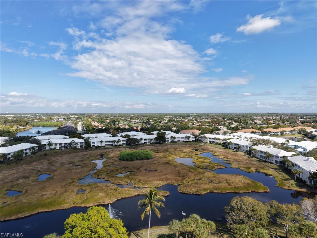 Aerial view of residential area with a large body of water