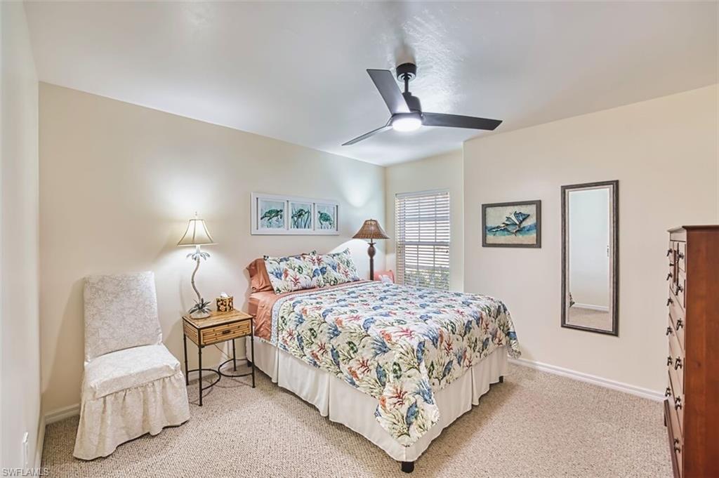 Bedroom featuring carpet and a ceiling fan