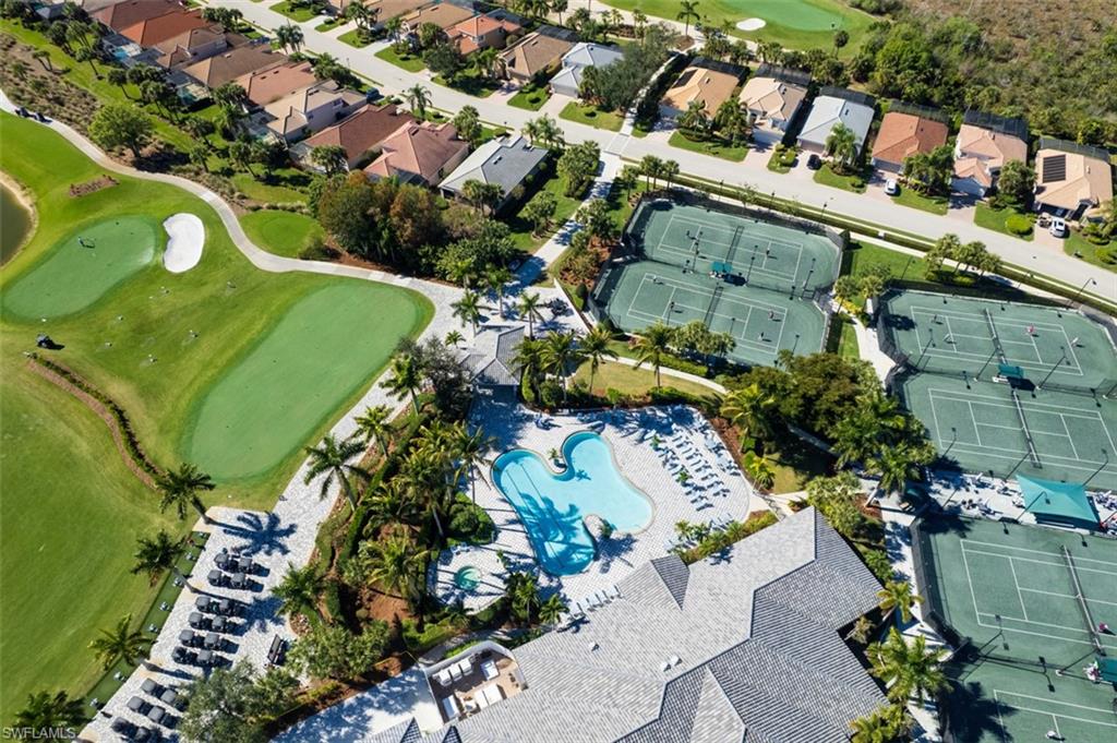 View of property location with a local golf course and nearby suburban area