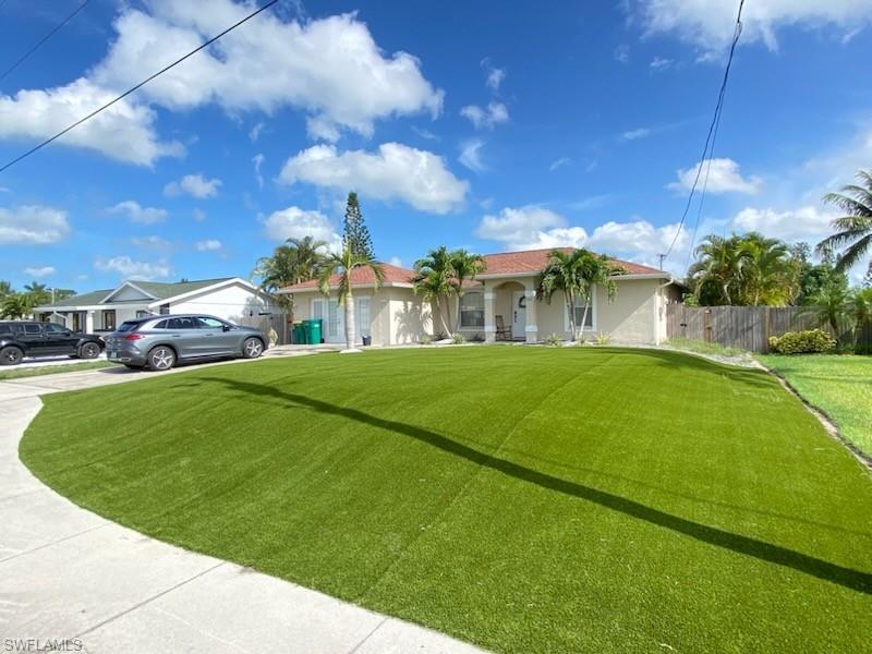 Mediterranean / spanish house featuring concrete driveway
