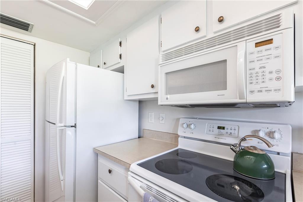 Kitchen with newer white appliances