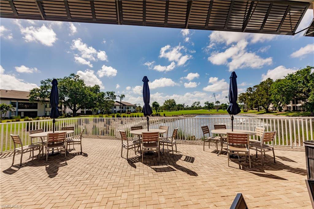 View of patio with outdoor dining area and a residential view