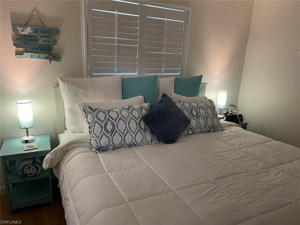 Bedroom with wood finished floors