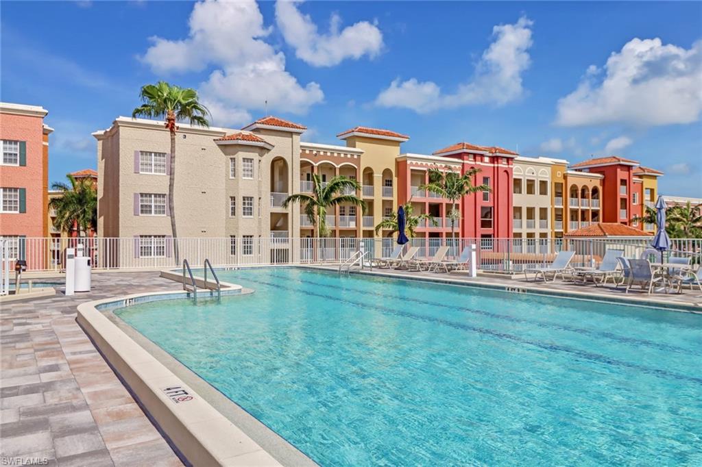 Community pool with a patio area