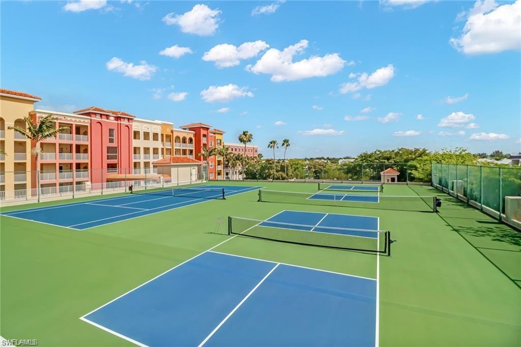 View of tennis court with community basketball court