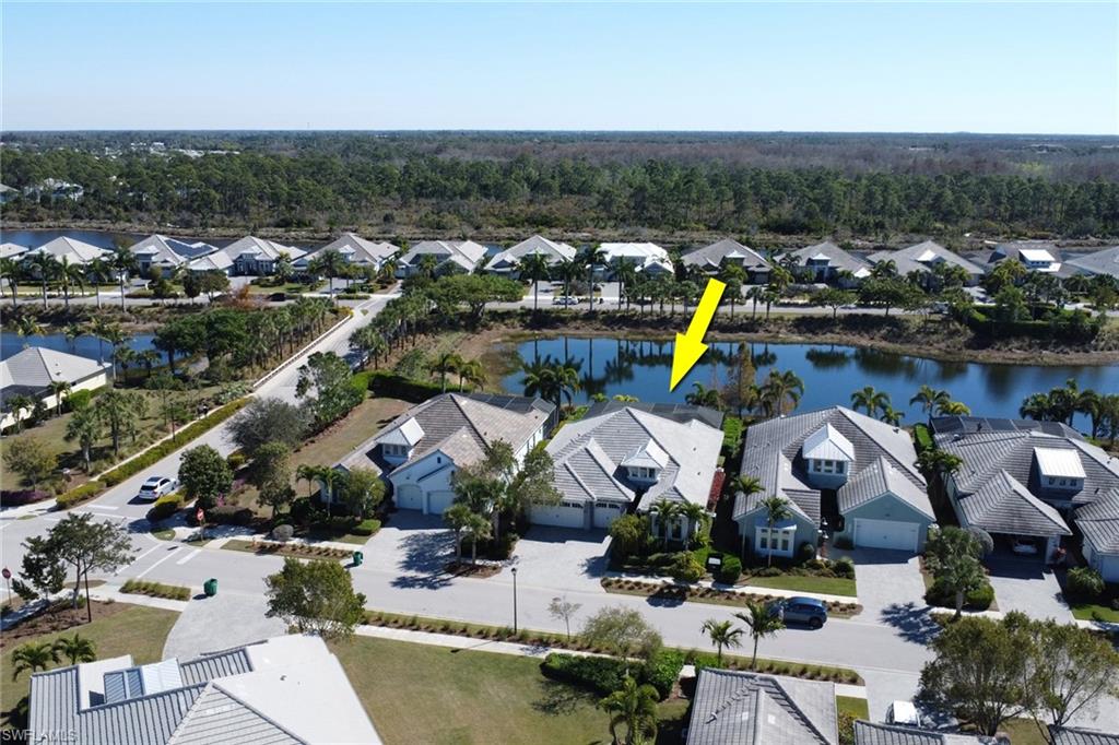Aerial view of residential area with a large body of water
