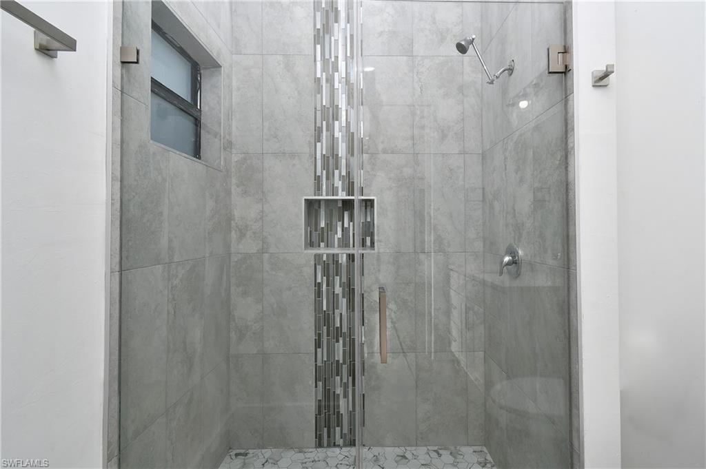 Bathroom featuring a stall shower