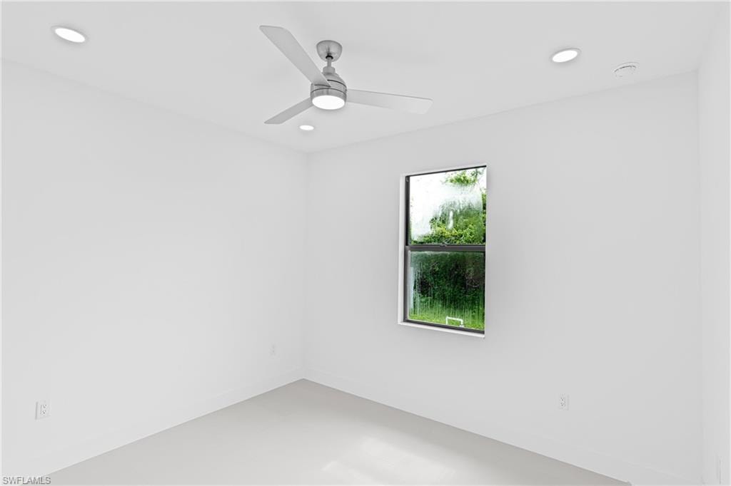 Unfurnished room with recessed lighting and a ceiling fan