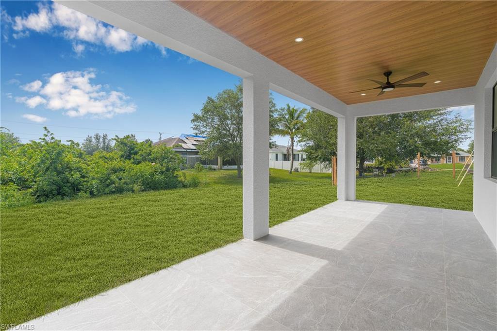 View of patio with a ceiling fan