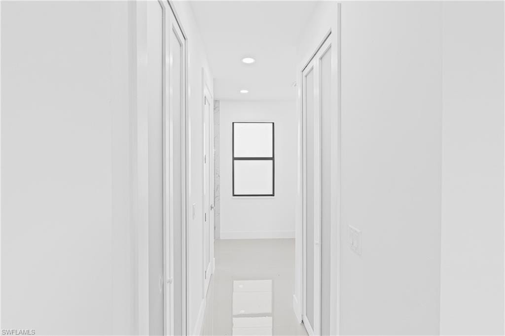 Hall featuring recessed lighting