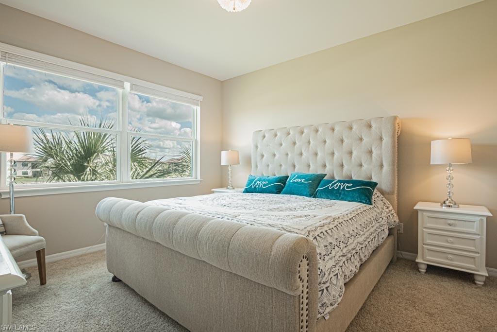 neutral carpet & decor, View of golf course