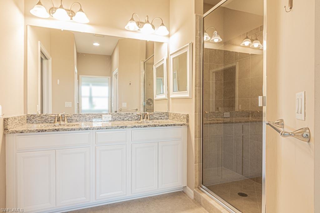 double sinks, tile flooring & nice size tiled shower