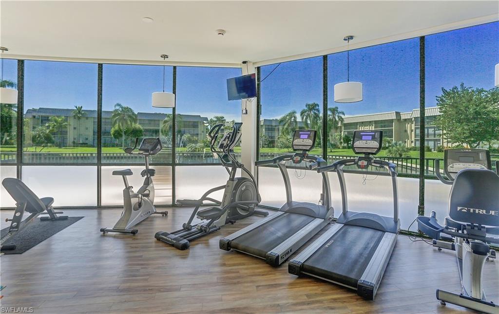 Exercise room with floor to ceiling windows