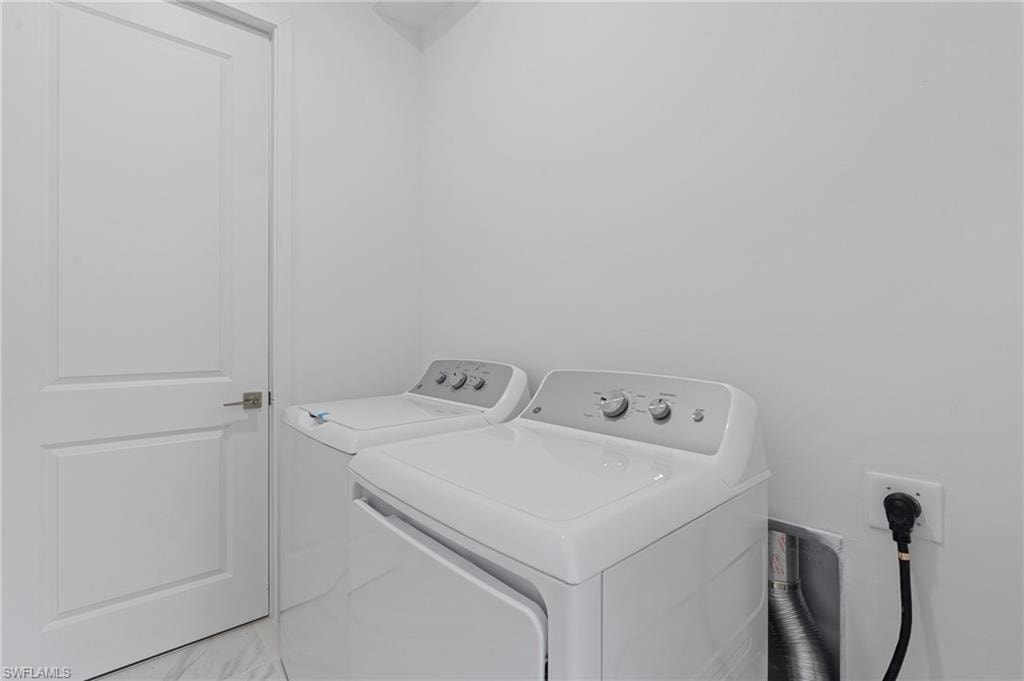 Laundry area with separate washer and dryer