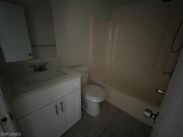 Bathroom featuring vanity, bathing tub / shower combination, and tile patterned floors
