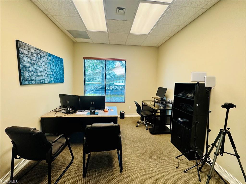 Home office featuring a paneled ceiling