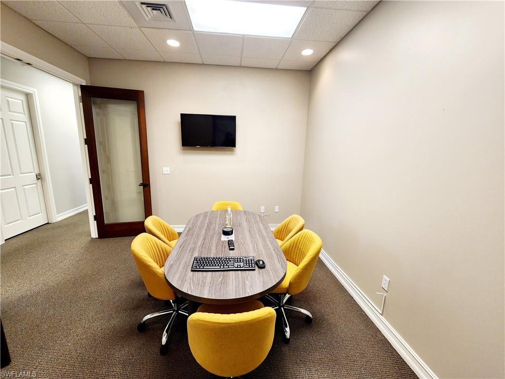 Playroom featuring a drop ceiling and recessed lighting