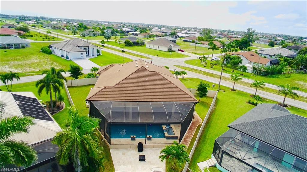 Aerial view of residential area with a pool
