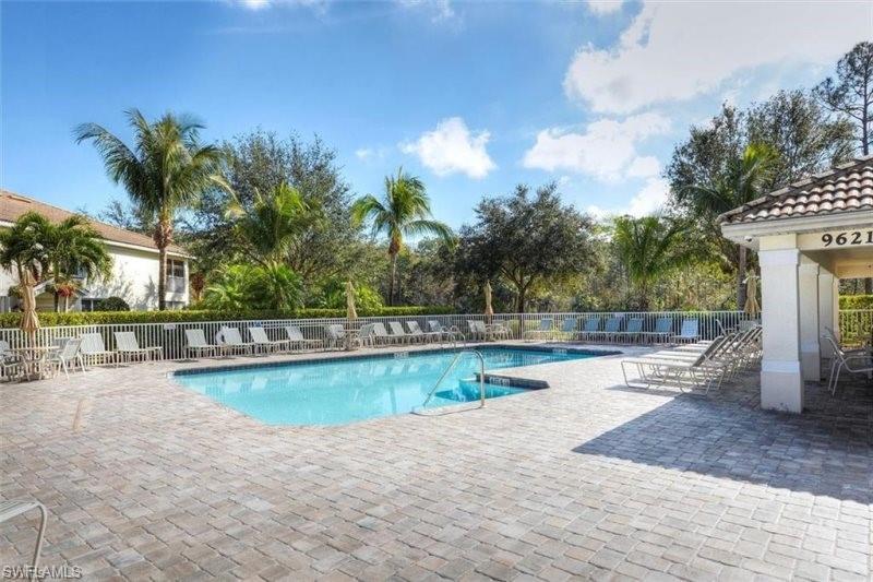Community pool featuring a patio area