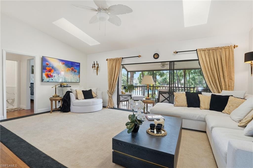 Light-filled, open-concept space with two skylights that flood the room with natural light and seamless access to outdoor living areas.