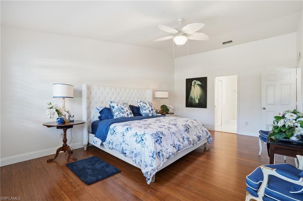 Primary Bedroom features loads of space, natural light, and patio access