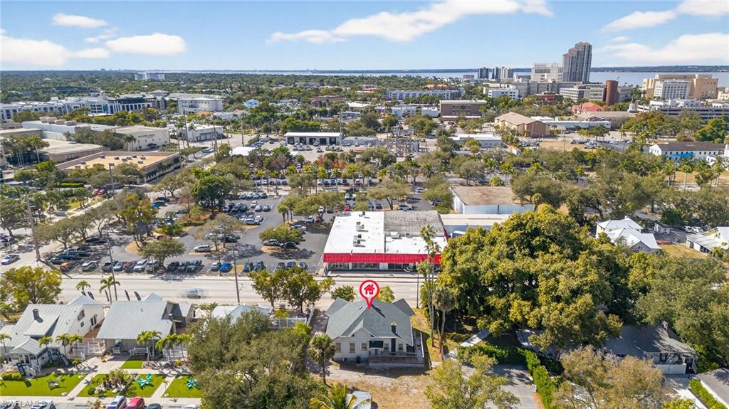 Aerial view of property's location featuring nearby urban area