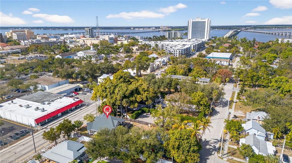 Aerial overview of property's location with a notable bridge and a large body of water
