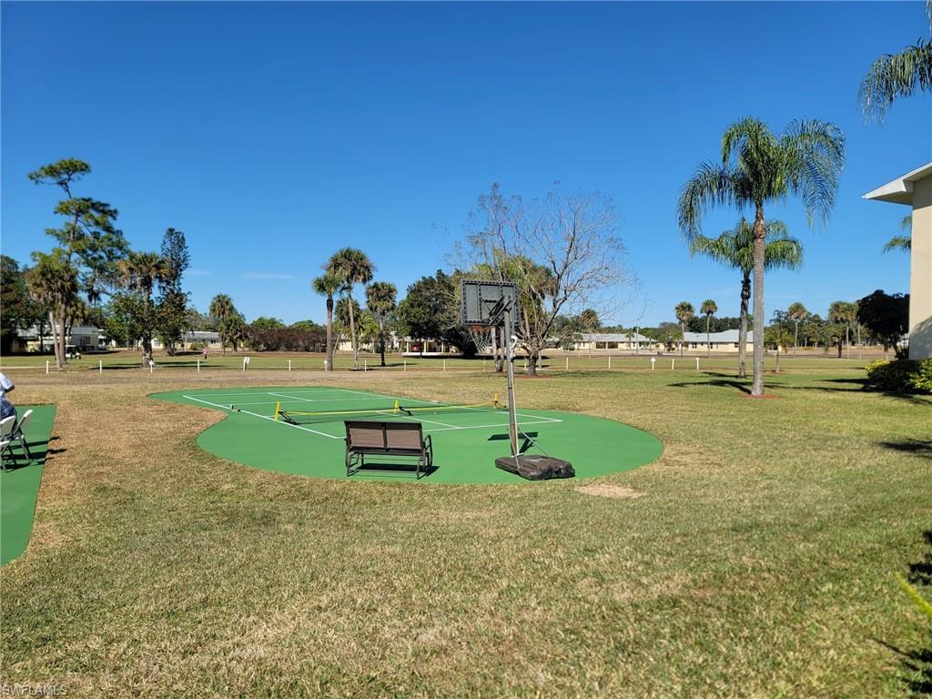 Surrounding community with community basketball court