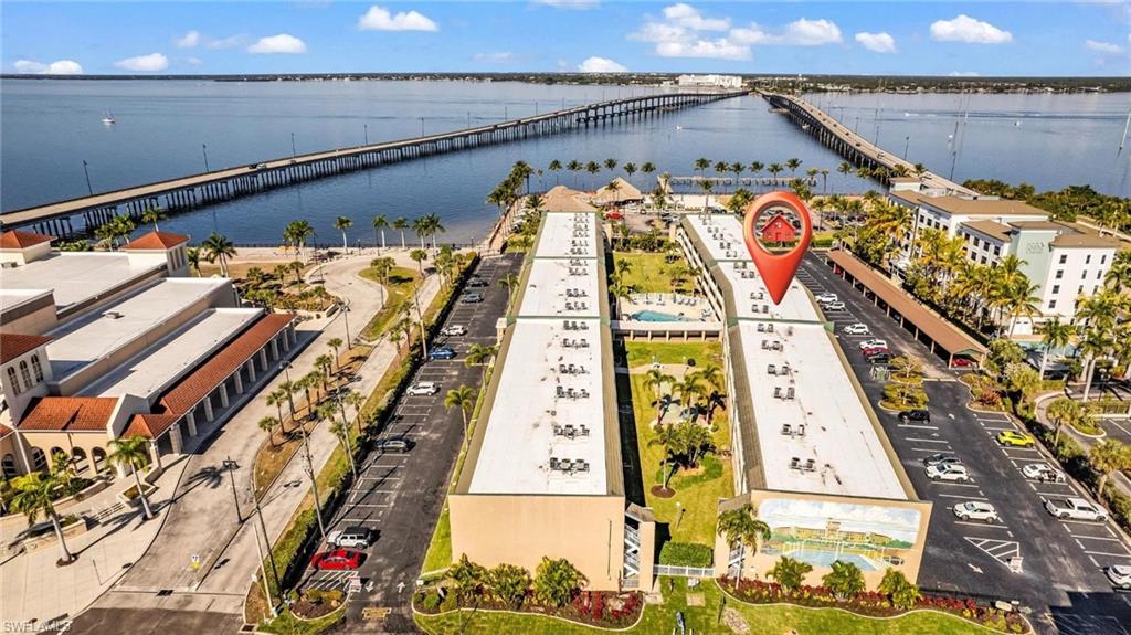 Drone / aerial view of a notable bridge and a large body of water