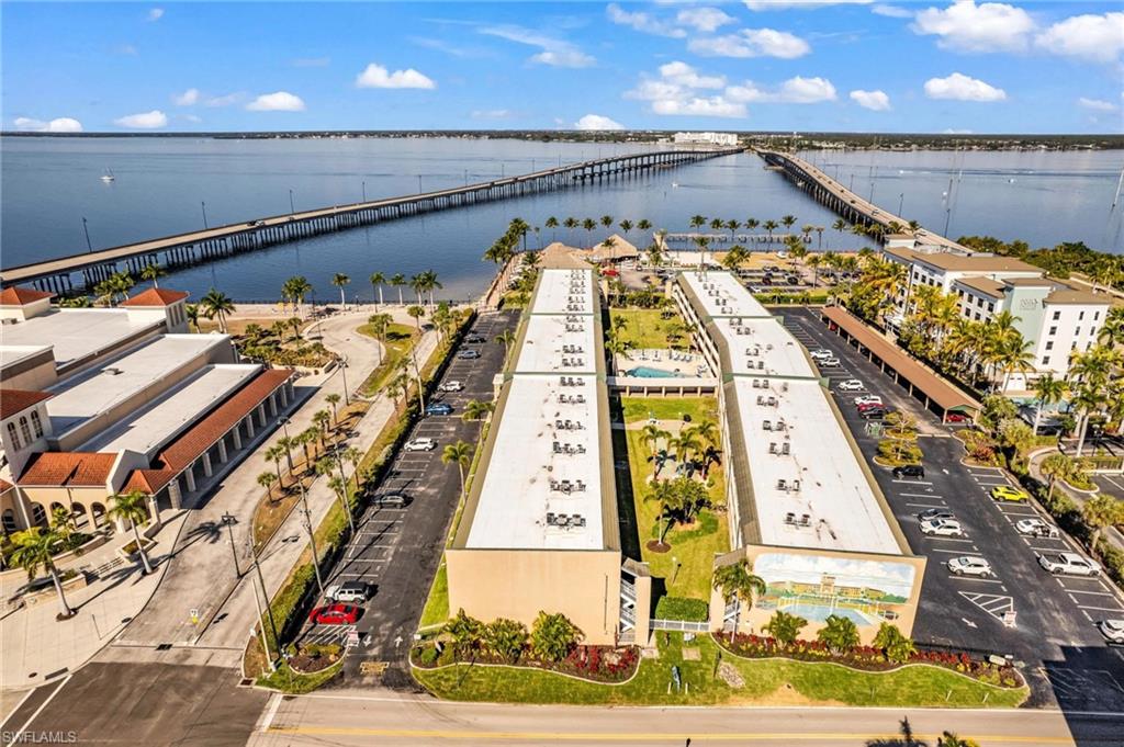 Drone / aerial view of a notable bridge and a nearby body of water