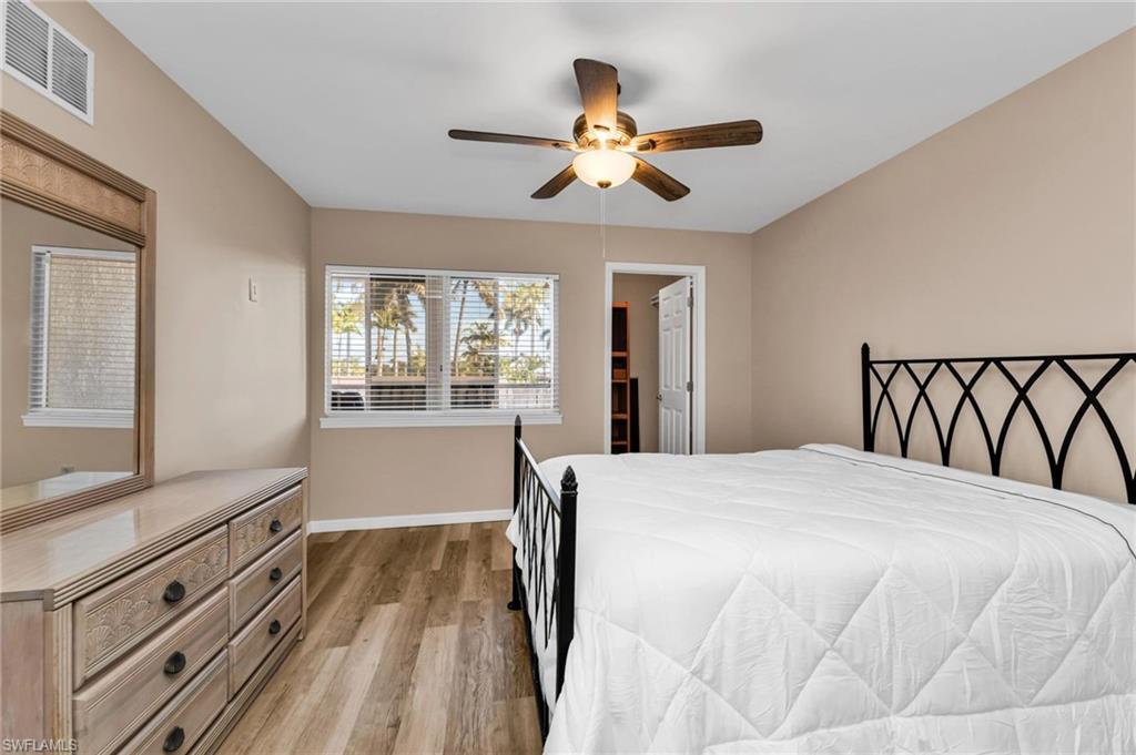 Bedroom featuring light wood-style floors and a ceiling fan