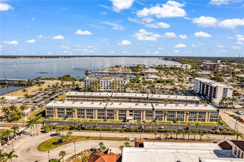 Aerial view of a large body of water and apartment complex