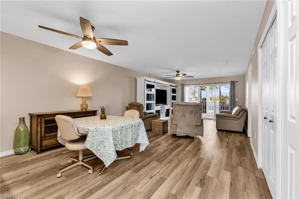 Dining room featuring light wood finished floors and a ceiling fan