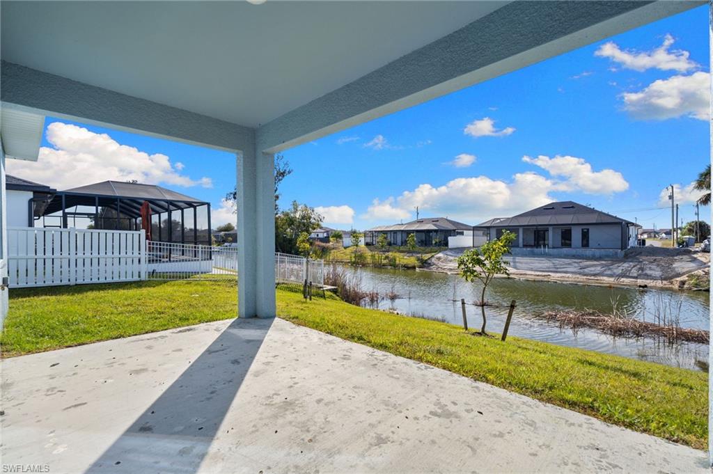 View of patio / terrace featuring a water view