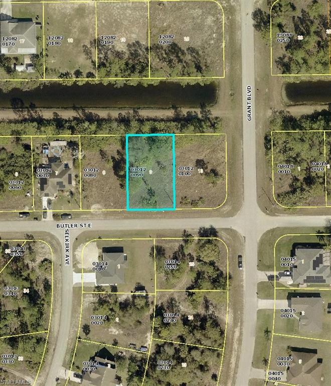 Aerial overview of property's location featuring property parcel outlined