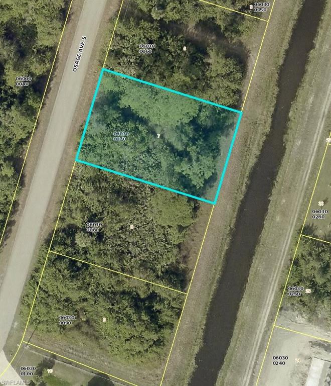 Aerial map of property and surrounding area with property parcel outlined
