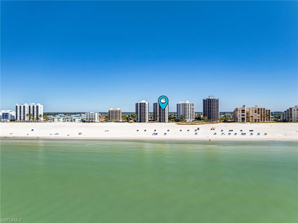 Water view with nearby beach and nearby urban area