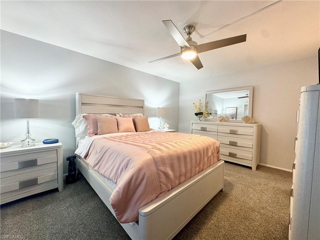 Bedroom featuring carpet flooring and a ceiling fan