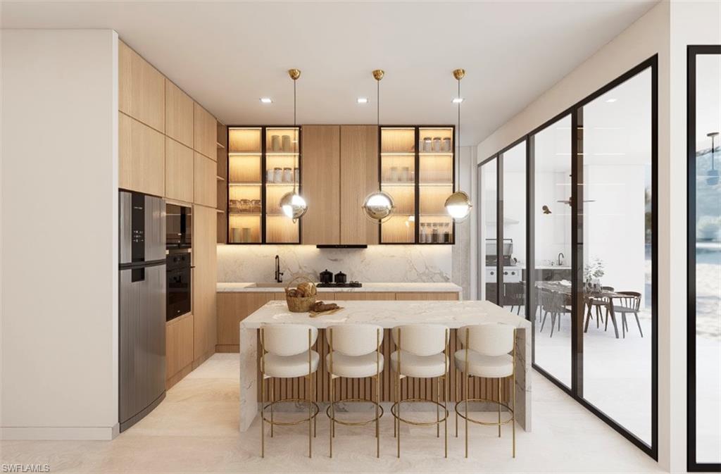 Kitchen featuring modern cabinets, hanging light fixtures, a breakfast bar, light stone counters, and black appliances (Rendered photo)