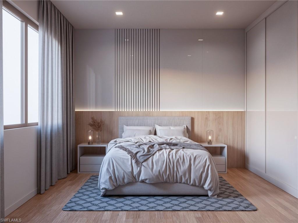 Bedroom featuring light wood-style flooring (Rendered photo)