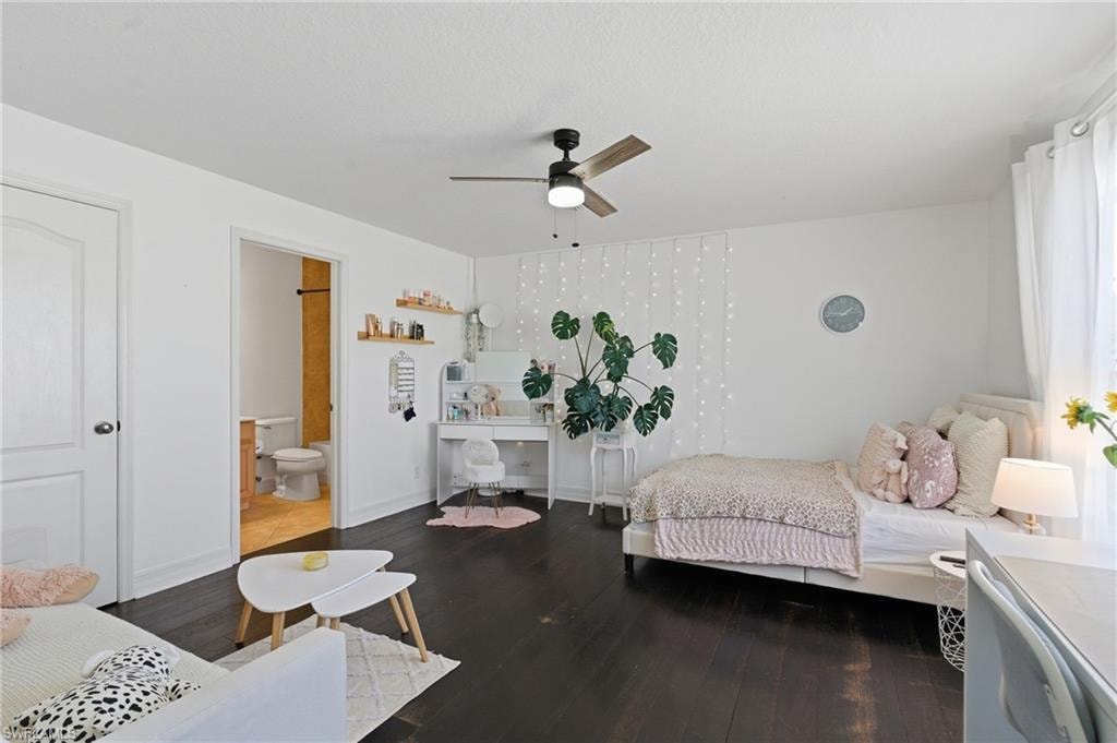 Bedroom with wood finished floors and a ceiling fan