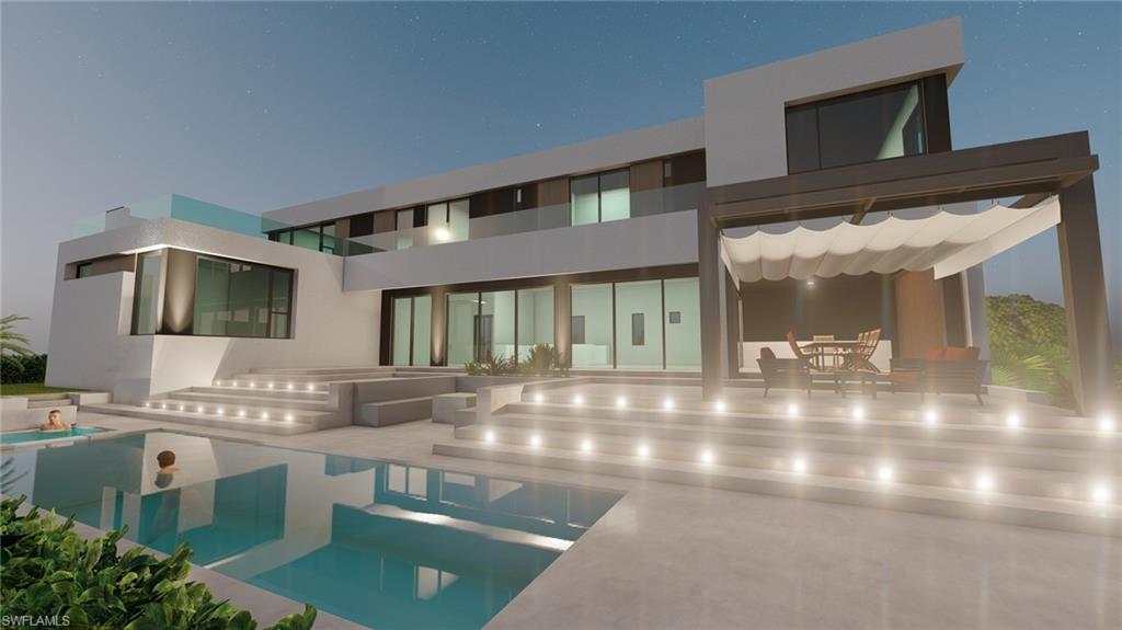Rear view of property with stucco siding, a patio, and an outdoor pool