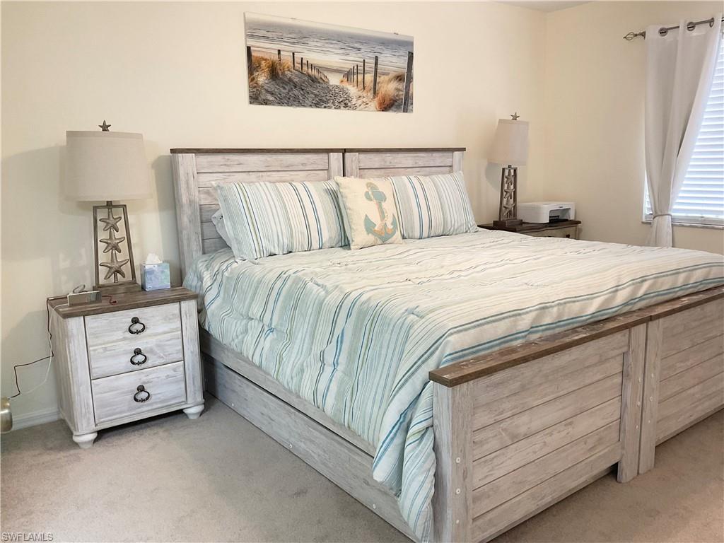 Primary Bedroom with King bed and twin trundles underneath