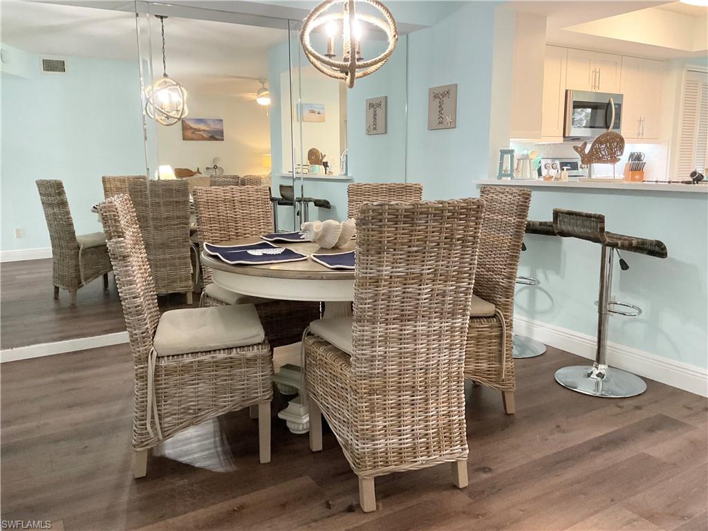 Dining area with vinyl wood-style floors