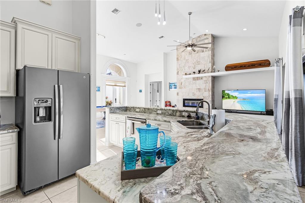 Open Concept Kitchen w/ stainless steel appliances