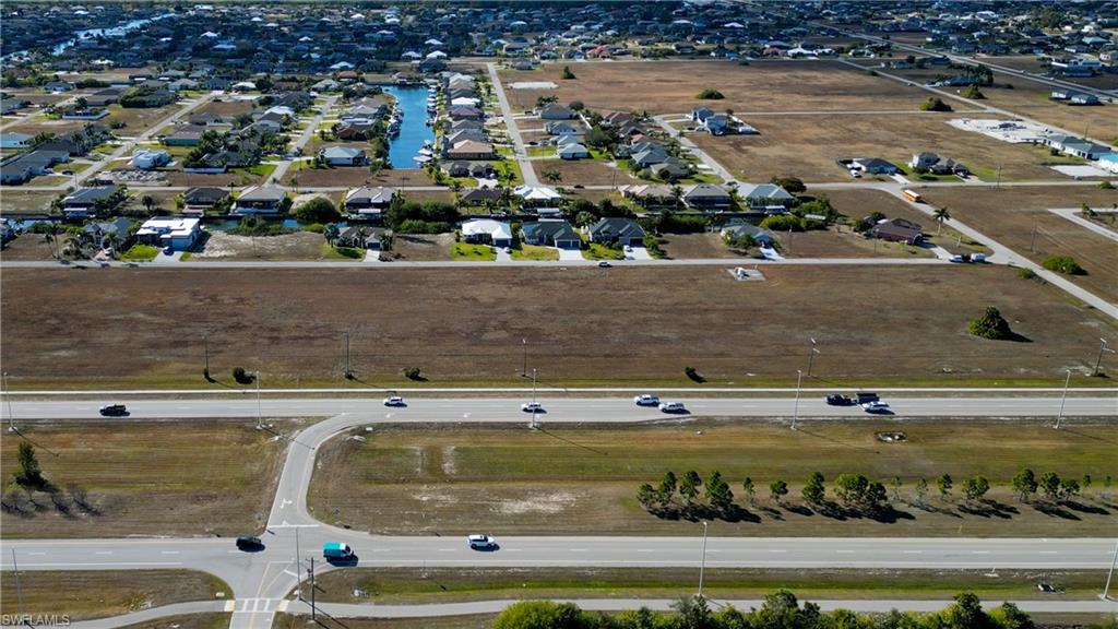 Aerial overview of property's location with nearby suburban area