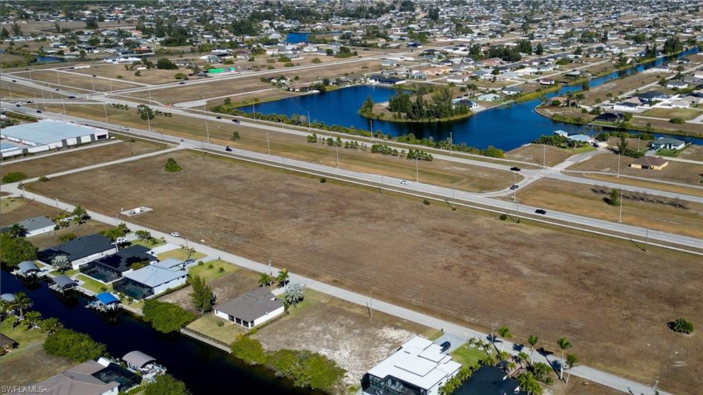 Aerial view of residential area with a nearby body of water