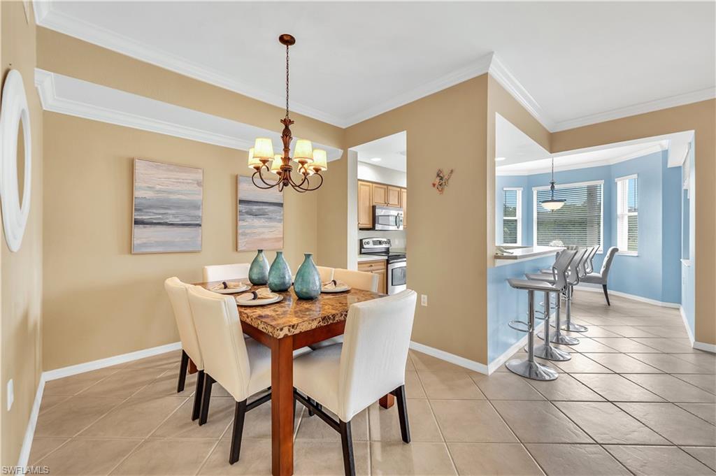 Flex space being used as a dining room. Could be den, sitting area or other.