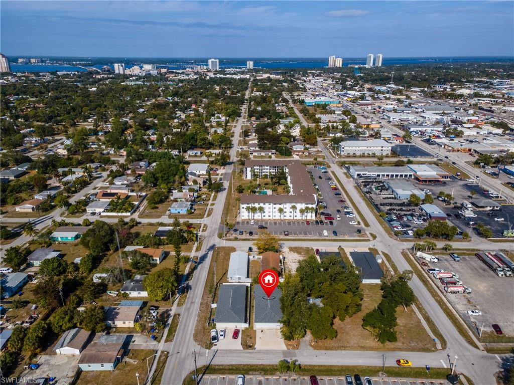 Aerial view of property's location featuring nearby urban area